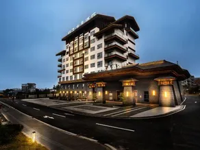 Xingyi Wanfenglin Airport Crystal Orange Hotel - Image 4