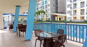 Spacious 36sqm Studio with 65" TV Netflix Karaoke and Pool Access Near Airport and Samal Ferry - Image 5