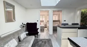 CozyNest 2BR Modern Property with Parking - Image 4