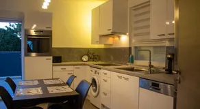 Joli appartement en RDC dans une maison neuve - Image 3
