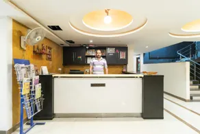 Capital O Hotel Laxmi Inn - Image 4