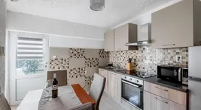 Appartement de vacances avec jardin, barbecue et terrasse | Vue jardin - Image 5