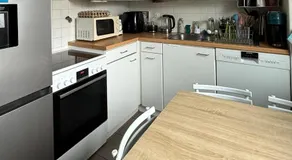 Double room and private bath in a shared flat, quiet, close to the UN and airport - Image 3