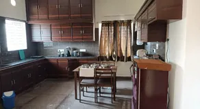Four Seasons Homestay - Best Homestay in Tirupati- Luxurious Two Bedrooms Luxury AC apartments - Fast WiFi, Kitchen, Android TV - Easy access to Airport, Railway Station and to all Temples - Image 4