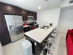Vacay Spot experience Luna Sky! 65" TV BAR, BBQ, SHOWER massage jets, music, go to FL Keys - Image 2