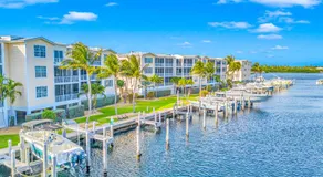 Ocean View Duplex Penthouse Retreat amenities: tennis court heated Pool Vista Key One - Image 5