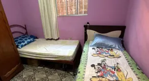 Quarto com duas camas confortáveis - Image 5