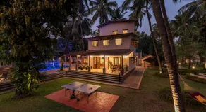 SaffronStays Casa Del Palms - 8BR luxury pool villa with gazebo, pickleball, bar & lawns near Nagaon Beach - Image 4