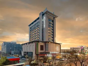 Magnotel Feicheng Xinhua Building - Image 5