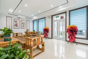 Haidaiqingshe Audio-Visual Homestay Hotel - Image 4