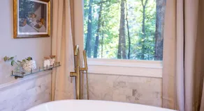 Sink into the Luxe Corner Tub at an Upscale, Spacious Home - Image 5