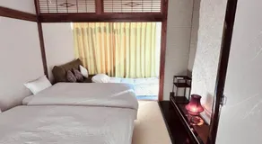 安里乃仲Traditional samurai residence with a family bath for rent Hideaway Villa with open-air bath, wood deck terrace, AI massage chair - Image 2