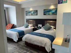 Home Inn Huaxuan Collection Hotel (Zhangzhou Kaihua Kaiyang Hotel) - Image 4