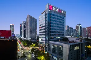 Echarm Plus Hotel Hangzhou Binjiang Xingguang Avenue - Image 1