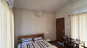 Woodpecker Homestay - Image 2