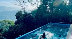 Serenehills Retreat with Hilltop pool - Image 4