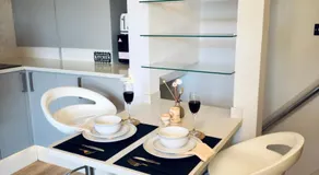 Chic Cozy Room with PS5, Mini Bar & Shared Spaces - Image 3