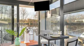 Charming Tiny Houseboat Escape Near Amsterdam by Weltevreden Experience - Image 3
