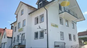 Charmant appartement de vacances convivial et familial avec barbecue, terrasse et jardin | Vue jardin | Adapté au travail à distance - Image 5