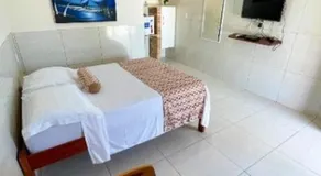 Sua própria pousada na praia - Image 2