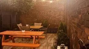 1850s historic Row House 7min train to NYC with private backyard - Image 5