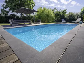 A charming holiday home with a swimming pool. - Image 2