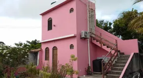Casa Rosa da Ilha - Suíte com Ar-condicionado e Jardim Amplo - Image 5
