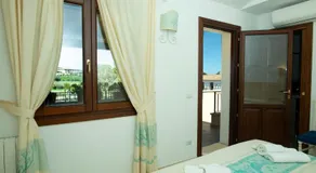 Guesthouse La Locanda - Comfy Rooms & Local Food - Image 2