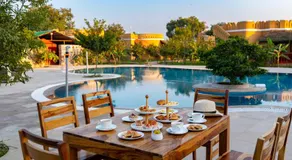 Aanandam Villas and Resort by ELIVAAS Pet-friendly Premium Room With Shared Pool, Restaurant & Garden - Image 3