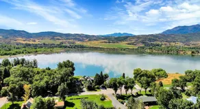 Stunner with Lake Mountain Views and Private Hot Tub - Image 3