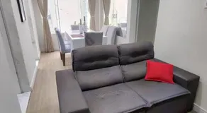 Apartamento inteiro com área e garagem privativa - Image 2