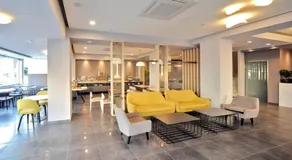 Astron Suites & Apartments - Image 5
