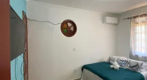 Suites e Quartos Em frente a Praia Grande -Na orla Flavia Alessandra - Image 3