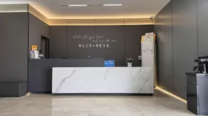 Longshan Business Hotel - Image 5