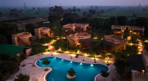 Aanandam Villas and Resort by ELIVAAS Pet-friendly Premium Room With Shared Pool, Restaurant & Garden - Image 5