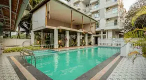 Palm View 1BHK with Pool & Café - Sazo Stays - Image 3