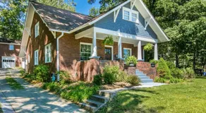 Roomy 5BR Bungalow with Backyard, Walk to Downtown - Image 2