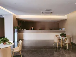 Kaixin.Xincheng Holiday Hotel - Image 4