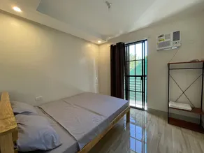 Roomiq Homestay - Cozy 2BR APT - Image 2