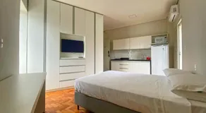 Prado Premium Lofts e Kitnets com Ar-Condicionado e TV Smart - Image 2