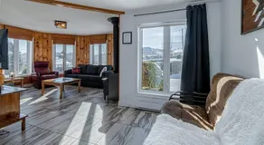 Spa, sauna et foyer : Le Phare de Baie-Saint-Paul - Image 2