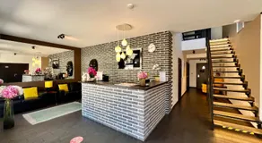 Grand Petit Hotel - Image 2
