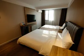 Hanting Premium Shanghai Jinyun Road Metro Station Hotel - Image 5