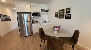 Modern Guest Suite with Living Room and King Bed - Image 3