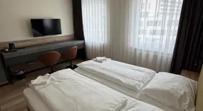 Turm Inn 24H Self Check In By H&H Hotels - Image 2