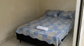Espaço Amplo de 2 quartos com 2 camas de casal e 1 de solteiro - Image 2