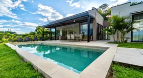 Modern Villa Surrounded by Nature and Gardens with Pool and Stunning Mountain and River Views - Image 2