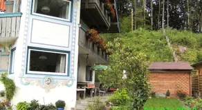 Appartement de vacances adapté aux familles avec terrasse, barbecue et jardin | Vue jardin - Image 3