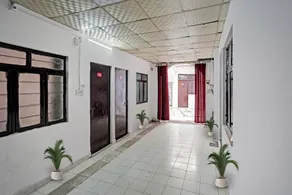 Flagship Hotel Happy Stay - Image 4