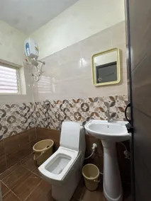 Navami Inn A/c & Non A/c Deluxe Rooms - Image 5